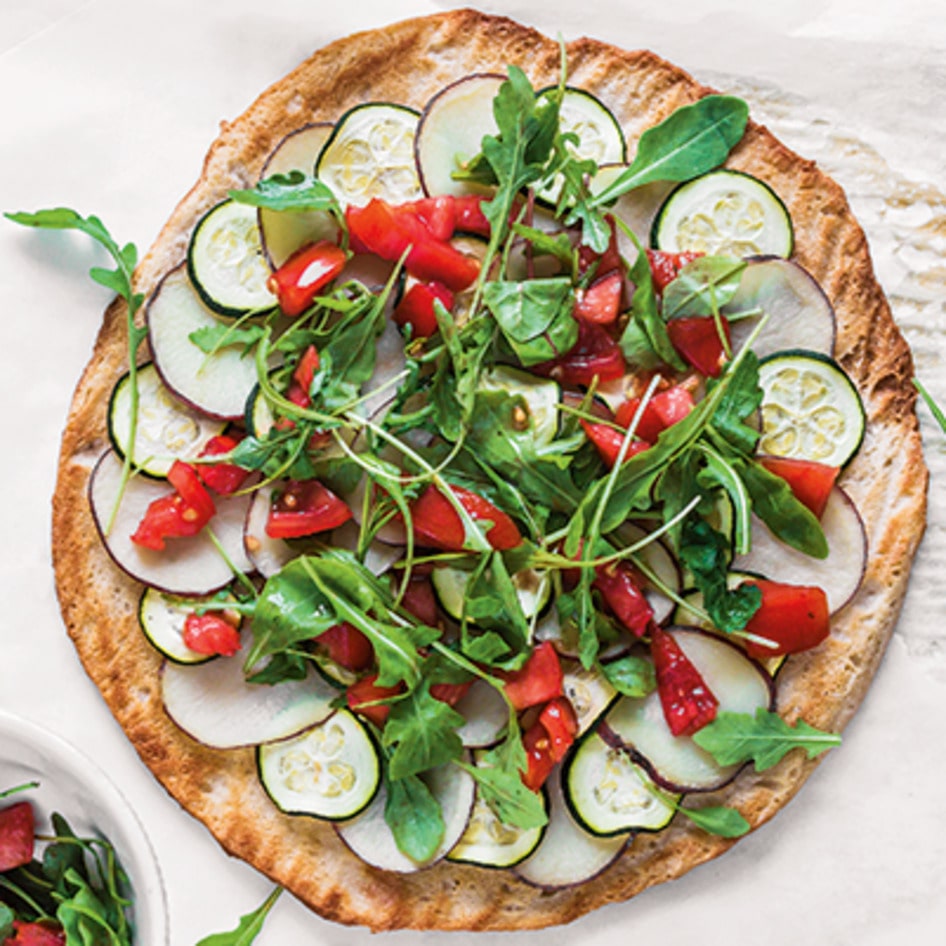 Roasted Potato Zucchini Pizza Topped With Arugula